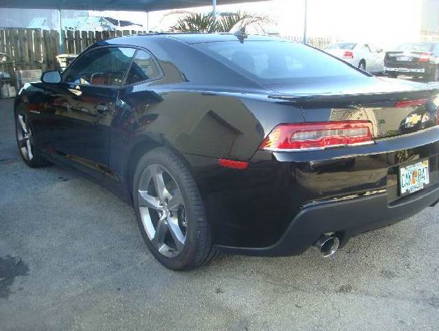 Photographs of a 2014 Chevrolet Camaro that was in an accident and repaired by Elite Paint & Body Shop in West Palm Beach Florida