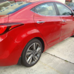 Before and after photographs of a damaged Hyundai Elantra that was repaired by Elite Paint & Body Shop