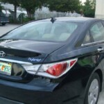 Before and after photographs of a damaged Hyundai that was repaired by Elite Paint & Body Shop in West Palm Beach, FL