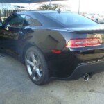 Photographs of a 2014 Chevrolet Camaro that was in an accident and repaired by Elite Paint & Body Shop in West Palm Beach Florida