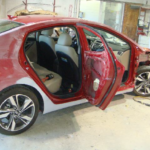 Before and after photographs of a damaged Hyundai Elantra that was repaired by Elite Paint & Body Shop
