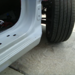 Before and after photographs of a damaged Hyundai Elantra that was repaired by Elite Paint & Body Shop
