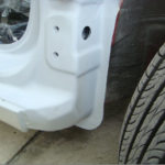 Before and after photographs of a damaged Hyundai Elantra that was repaired by Elite Paint & Body Shop
