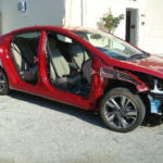 Before and after photographs of a damaged Hyundai Elantra that was repaired by Elite Paint & Body Shop