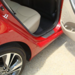 Before and after photographs of a damaged Hyundai Elantra that was repaired by Elite Paint & Body Shop
