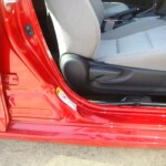 Before and after photographs of a damaged Red Toyota Corolla that was repaired by Elite Paint & Body Shop in West Palm Beach, Florida.