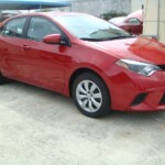 Before and after photographs of a damaged Red Toyota Corolla that was repaired by Elite Paint & Body Shop in West Palm Beach, Florida.