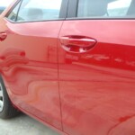 Before and after photographs of a damaged Red Toyota Corolla that was repaired by Elite Paint & Body Shop in West Palm Beach, Florida.