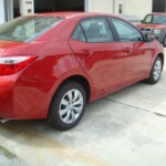 Before and after photographs of a damaged Red Toyota Corolla that was repaired by Elite Paint & Body Shop in West Palm Beach, Florida.