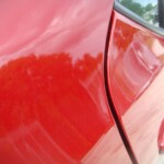 Before and after photographs of a damaged Red Toyota Corolla that was repaired by Elite Paint & Body Shop in West Palm Beach, Florida.