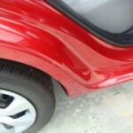 Before and after photographs of a damaged Red Toyota Corolla that was repaired by Elite Paint & Body Shop in West Palm Beach, Florida.