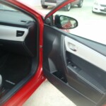 Before and after photographs of a damaged Red Toyota Corolla that was repaired by Elite Paint & Body Shop in West Palm Beach, Florida.