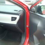 Before and after photographs of a damaged Red Toyota Corolla that was repaired by Elite Paint & Body Shop in West Palm Beach, Florida.