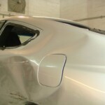 Before and after photographs of a damaged, silver, Honda Accord that was repaired by Elite Paint & Body Shop in West Palm Beach, FL.