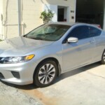 Before and after photographs of a damaged, silver, Honda Accord that was repaired by Elite Paint & Body Shop in West Palm Beach, FL.