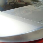 Before and after photographs of a damaged, silver, Honda Accord that was repaired by Elite Paint & Body Shop in West Palm Beach, FL.
