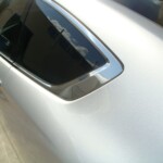 Before and after photographs of a damaged, silver, Honda Accord that was repaired by Elite Paint & Body Shop in West Palm Beach, FL.