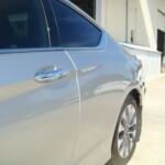 Before and after photographs of a damaged, silver, Honda Accord that was repaired by Elite Paint & Body Shop in West Palm Beach, FL.